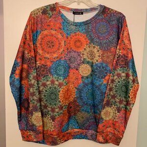 Brand new w/ tags colorful women's top. Super comfortable, cotton-poly blend.